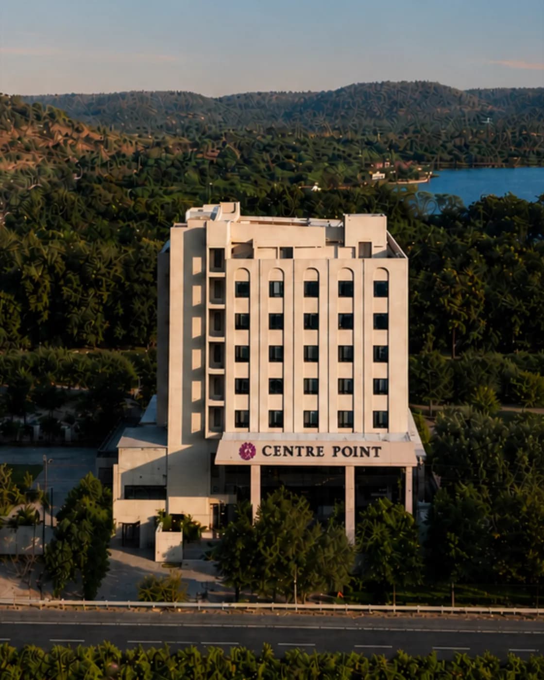 The exterior of Centre Point Amravati at dusk.