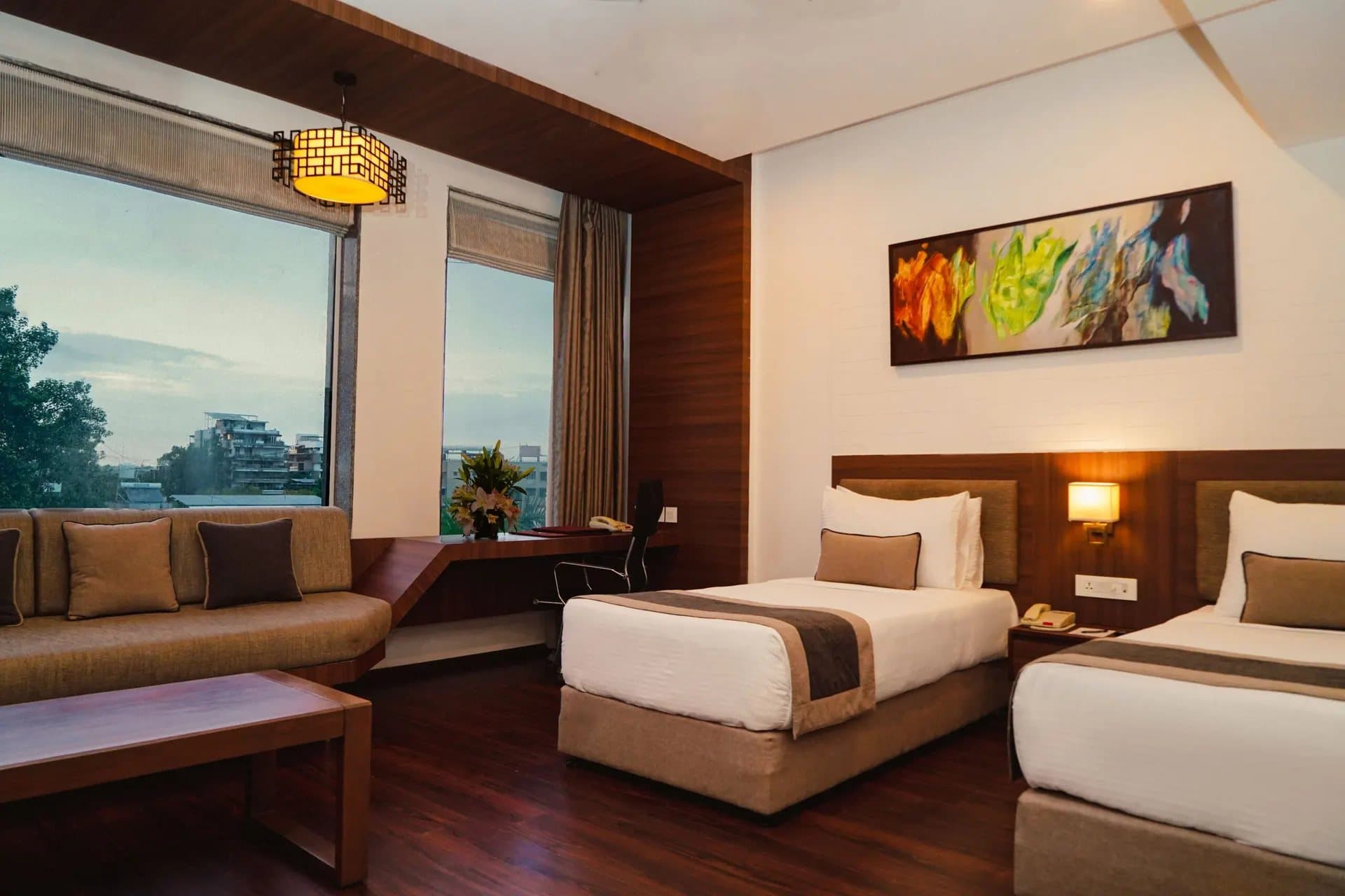 A premium guest room at Hotel Centre Point, Nagpur.